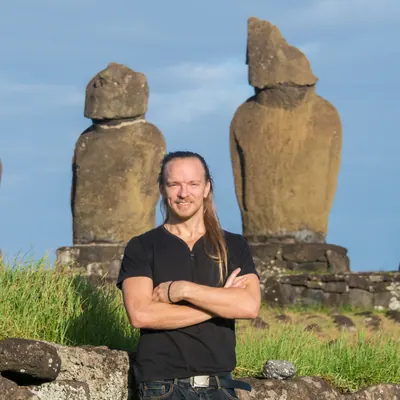 Marcus Edensky, founder of TourTask, in front of moai on Easter Island